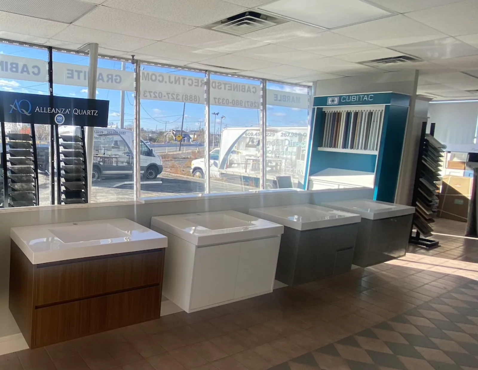 Showroom vanity and countertop displays by the front windows
